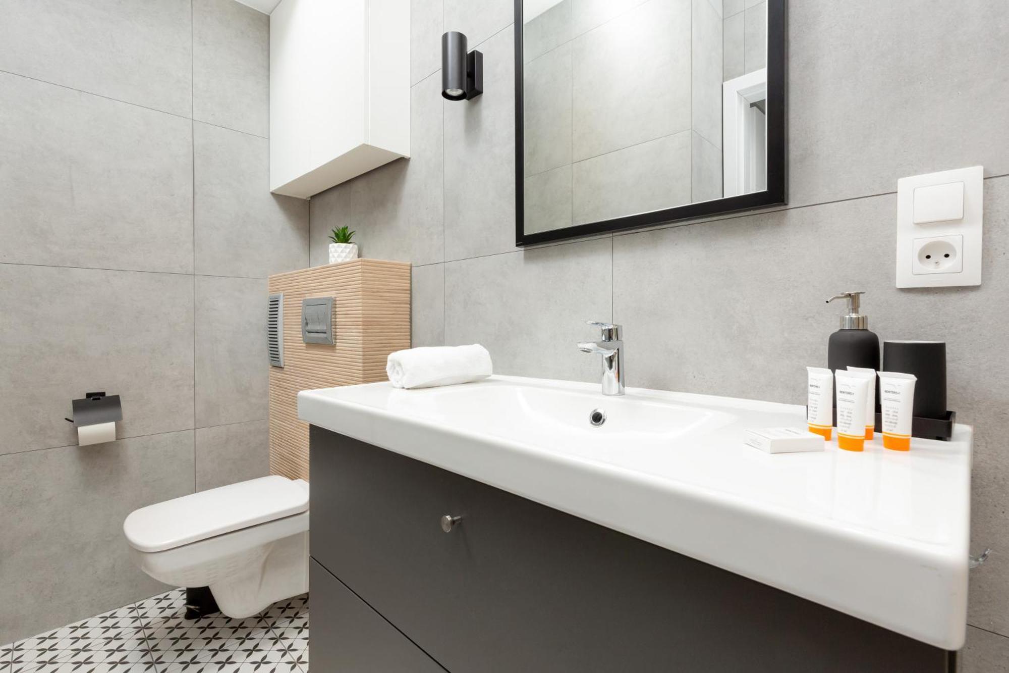 Central Apartment Emilii Plater By Noclegi Renters Varsó Kültér fotó